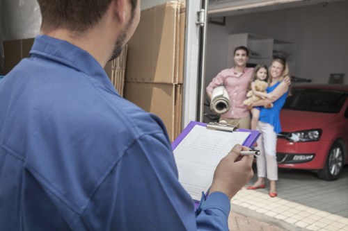 Loading furniture into a van for local transport in Peckham