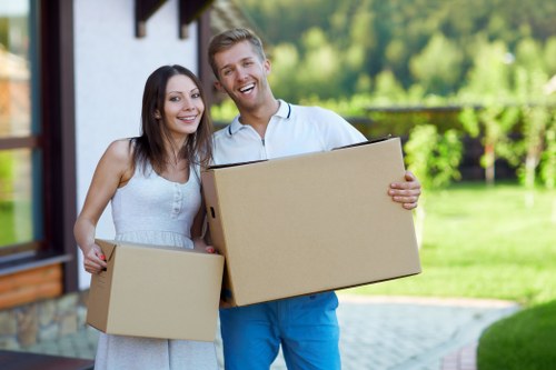 Professional packing service preparing boxes for a Peckham home move
