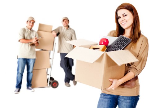 Furniture being carried from a Peckham property during relocation