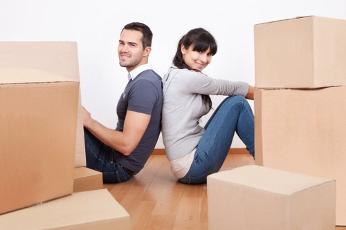 Organized moving boxes and household items handled by Peckham packers